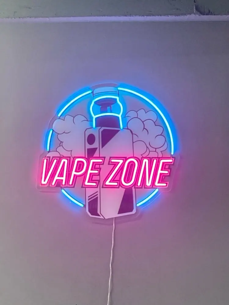 Neonowy szyld z motywem e-papi – Vaping Store recenzja i cena